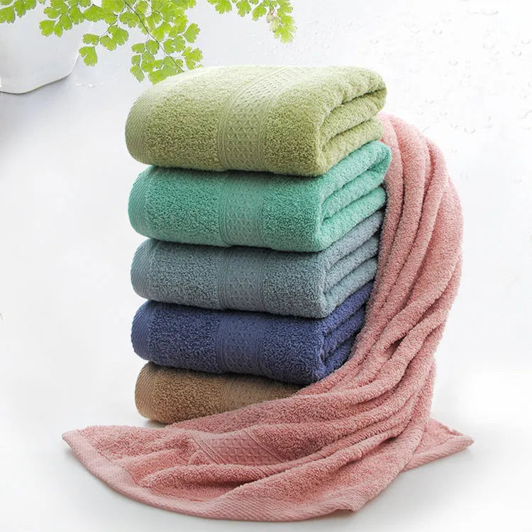 Thickened cotton blend bath and beach towel in apple green, dark blue, dark green, emerald green, light brown, or light pink.
