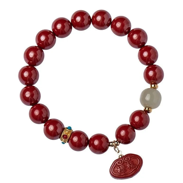 Red cinnabar bracelet with Ping An Fu Lu design in Emperor sandstone style showing 8mm and 10mm size options