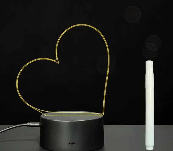 3D acrylic LED message board night light on a desk, showing illuminated surface and remote control