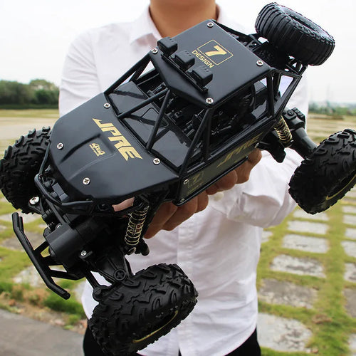 Black and silver 2.4G wireless remote control off-road cars in 28cm and 37cm sizes on rough terrain