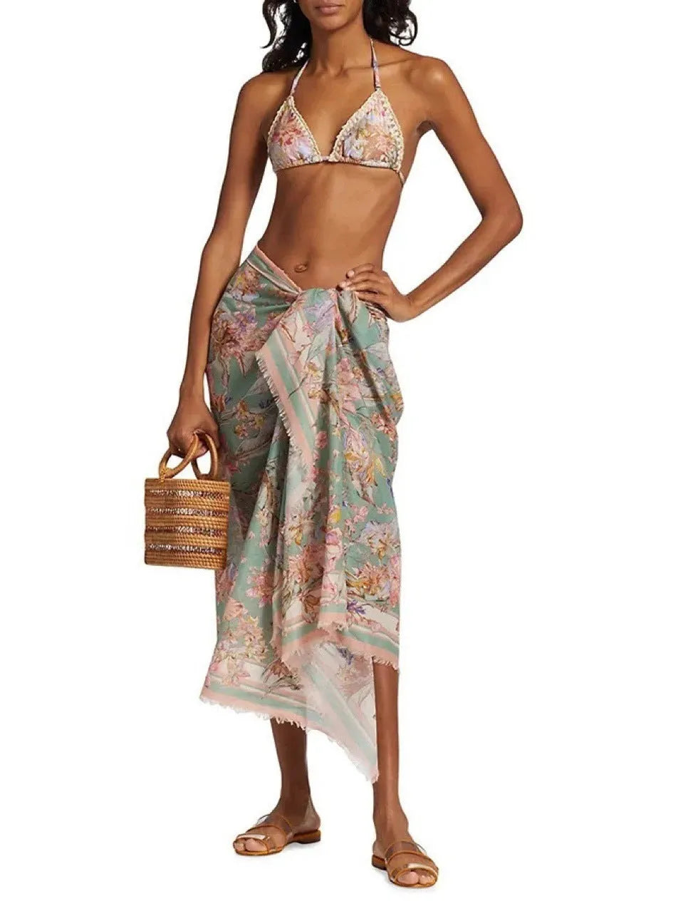 Women's floral print bikini set with matching skirt in creamy-white beige colour