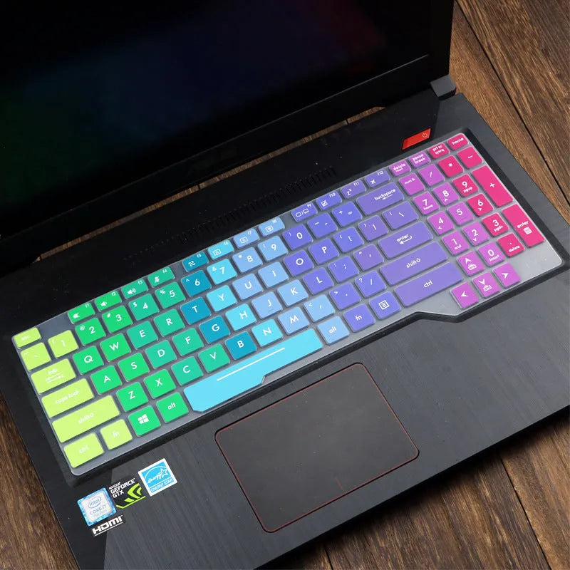 ASUS Flight laptop keyboard protective film cover in multiple colour options showing translucent and gradient designs