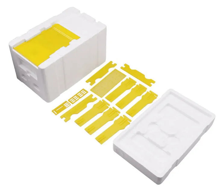 Three white EPS foam bee delivery boxes for beekeeping swarm capture and queen introduction.