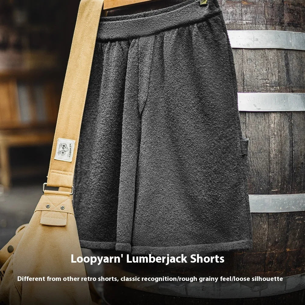Cement grey loose fit sports shorts with straight leg cut and elastic waistband