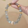 Emerald green Tian Shan Cui women's half bracelet with light green national style design.