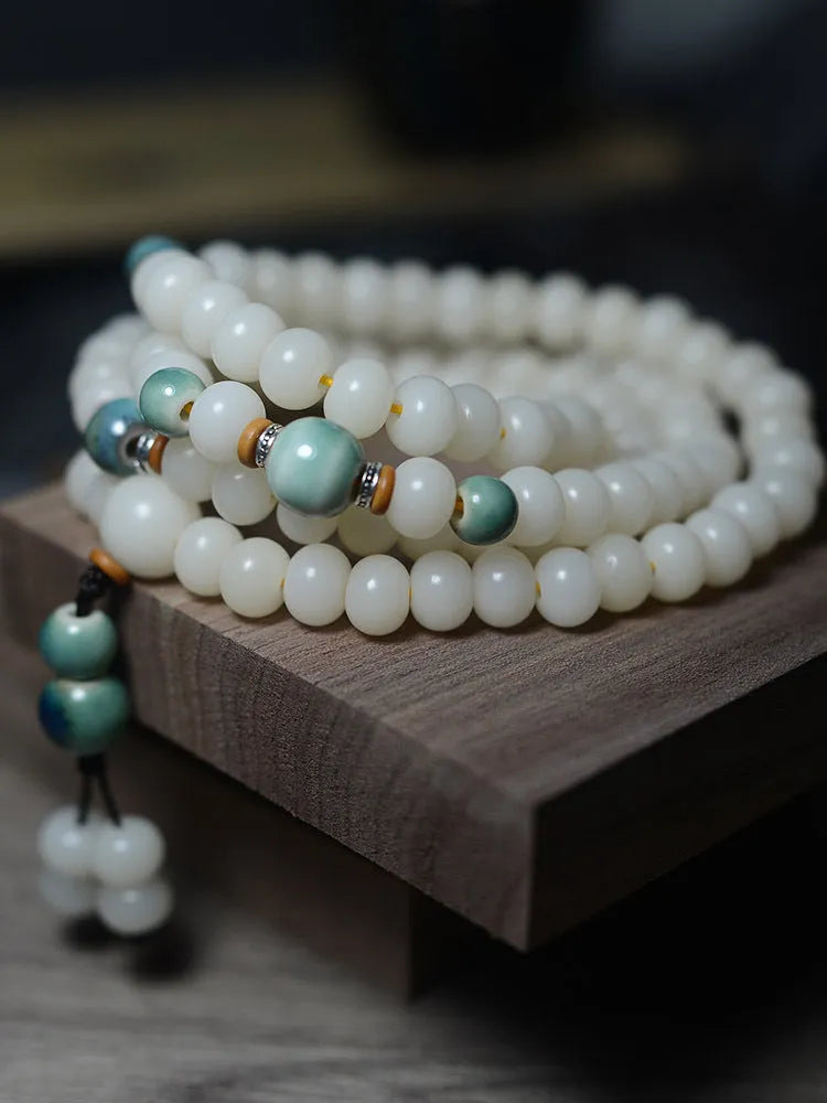 White jade bodhi seed bracelet with 108 flat round beads in 7x9mm and 8x10mm sizes