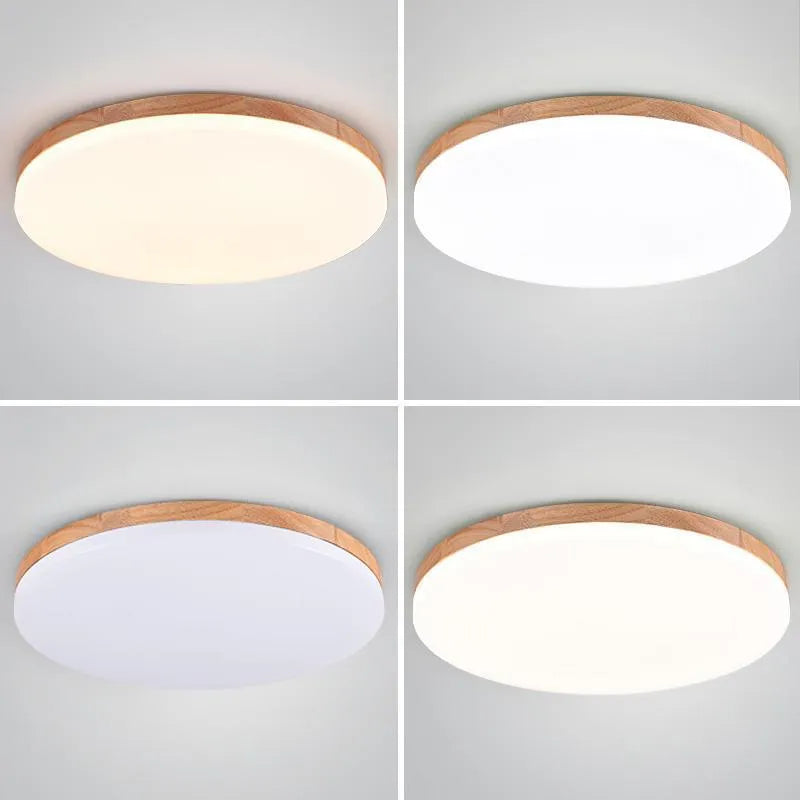 Japanese minimalist ceiling lamp with wood art body and acrylic shade in three available sizes.