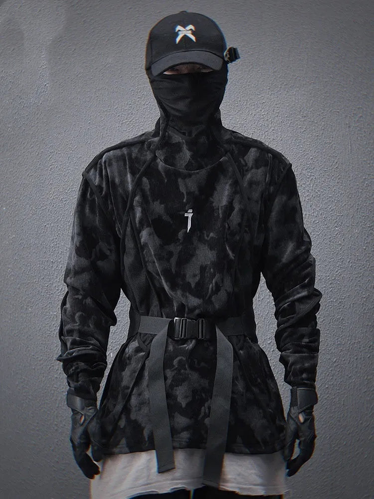Man wearing black tie dye printed sweater with finger turtleneck and drop shoulder sleeves