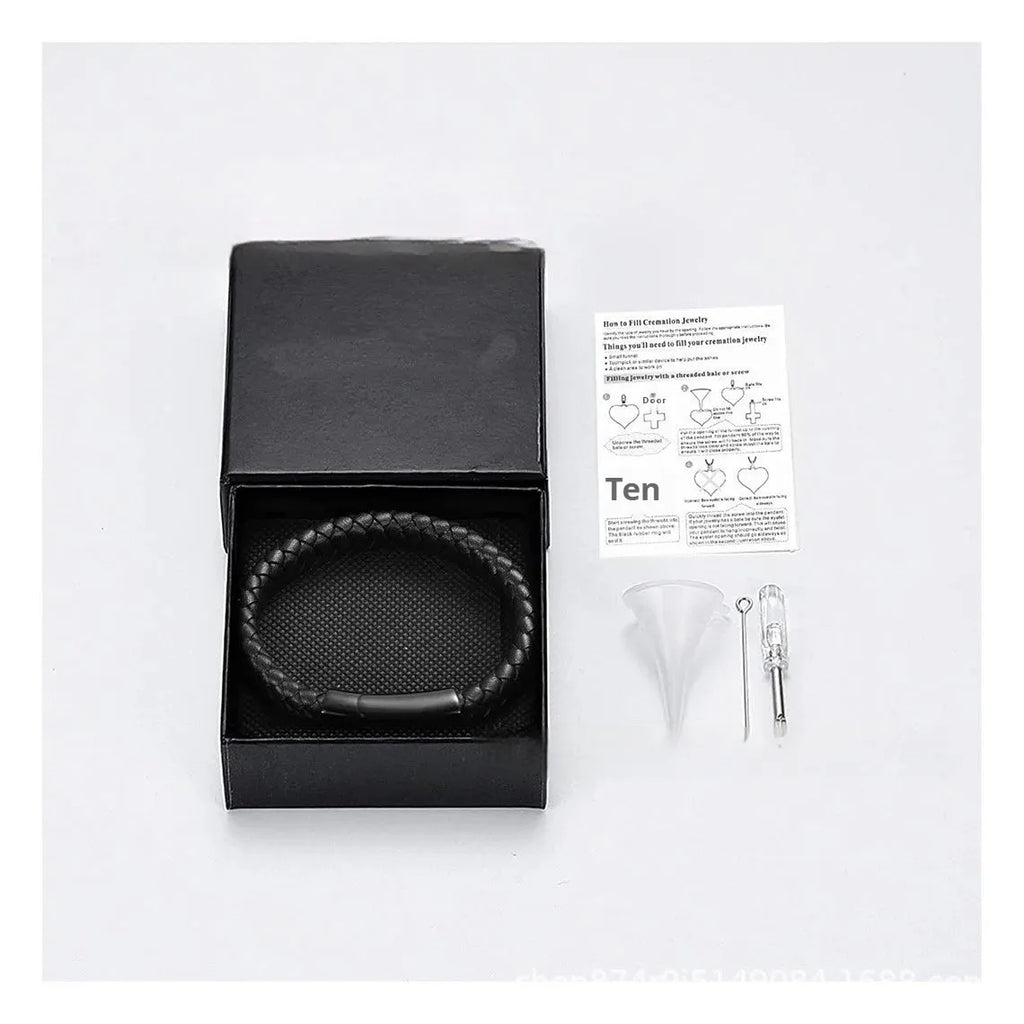 Black stainless steel and leather memorial bracelet with personalised lettering in a gift box.