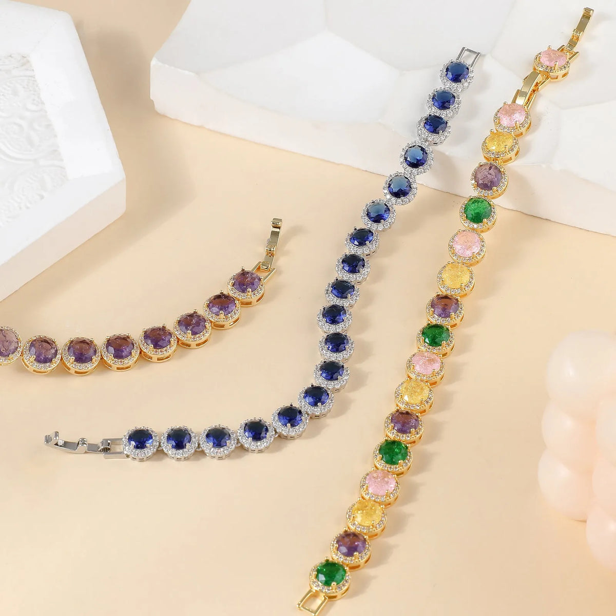 Gold-plated women's bracelet with inlaid zircon stones in a hollow round geometric shape