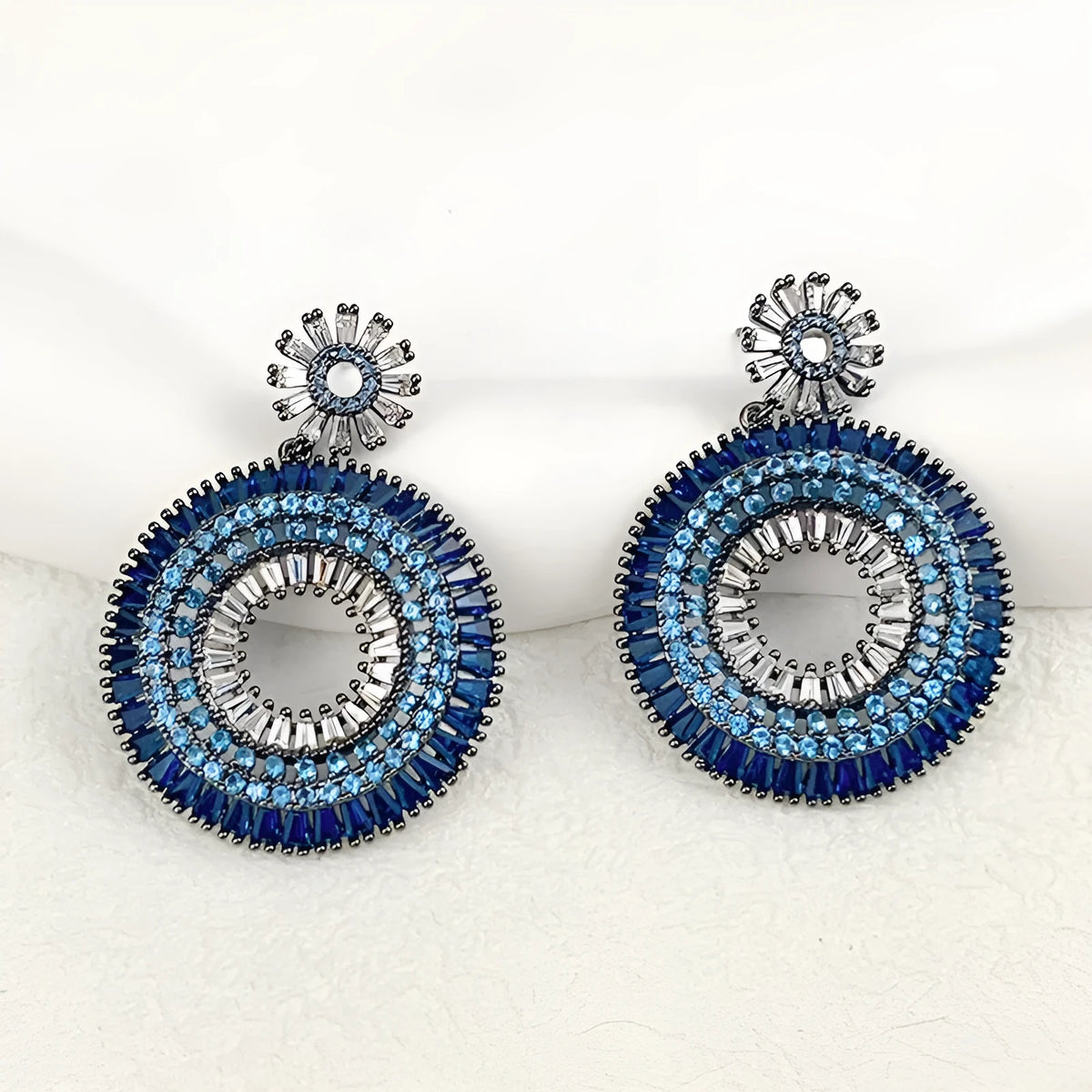 Rainbow hoop earrings for women in copper, 2.8cm x 3.8cm, shown in blue and pink