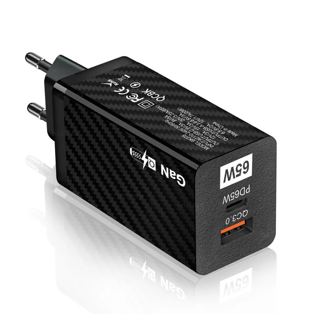 65W Gallium Nitride laptop charger in black with compact rectangular design showing USB+PD port