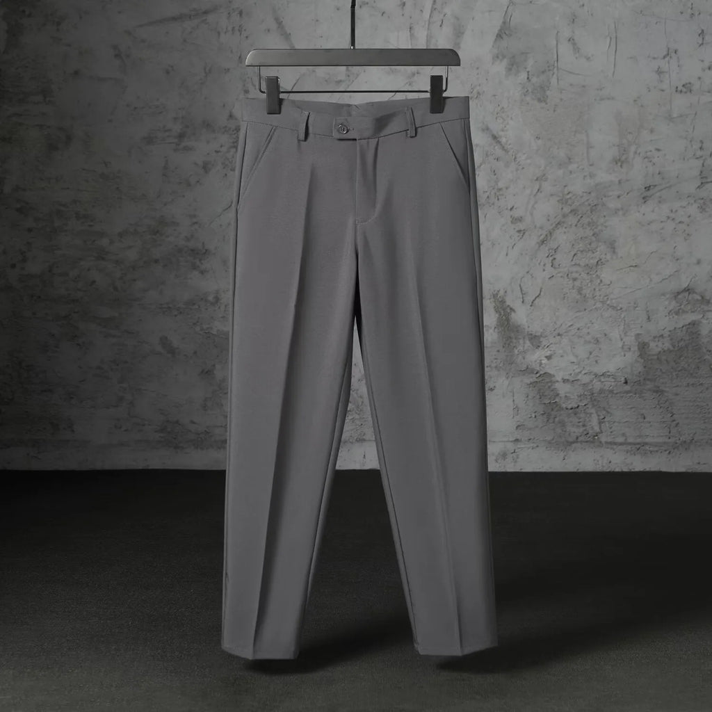 Men's straight loose trousers in light gray brushed polyester, front view showing straight cut and elastic waist