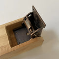 Furniture foot folding hinge with invisible self-locking mechanism in multiple electroplated finishes