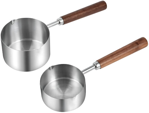 Two 304 stainless steel dog food scoops with wooden handles on a surface