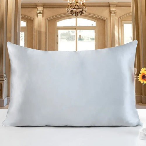 19 M double-sided silk pillowcase in apricot colour, showing envelope closure and smooth fabric texture.