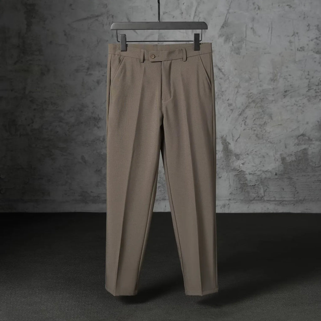 Men's straight loose trousers in light gray brushed polyester, front view showing straight cut and elastic waist