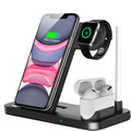 A folding 4-in-1 wireless charger in Space Gray, shown charging an iPhone in vertical stand mode and an Apple Pencil.