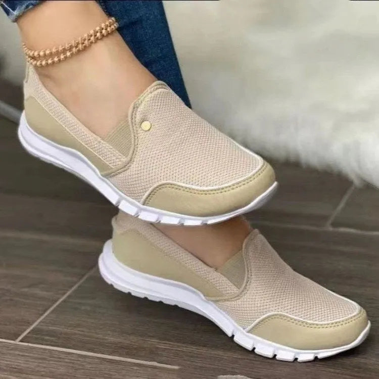 Canvas slip-on loafers for women flat heel round toe patent leather finish available in multiple colours