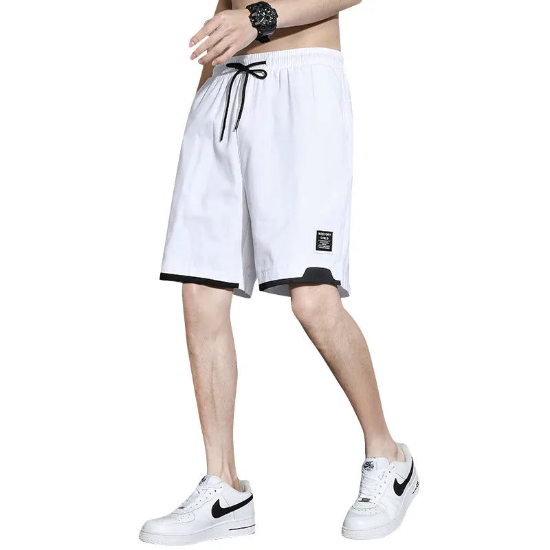 Cotton shorts for boys in plus sizes, showing mid waist and short length design in khaki colour.
