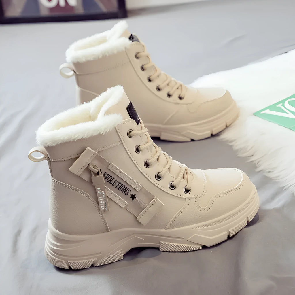 Plus size women's snow boot in black with velvet lining, showing mid-calf height and front lace-up.