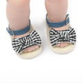 Pair of baby toddler shoes with Velcro fastening, breathable low-top upper, available in white or black, sizes 11cm to 13cm