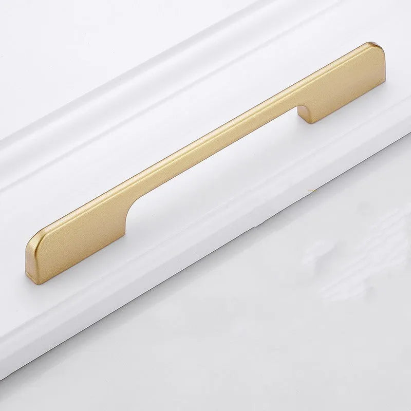 Gold coloured T-shape single hole cabinet handle made from aluminium alloy.