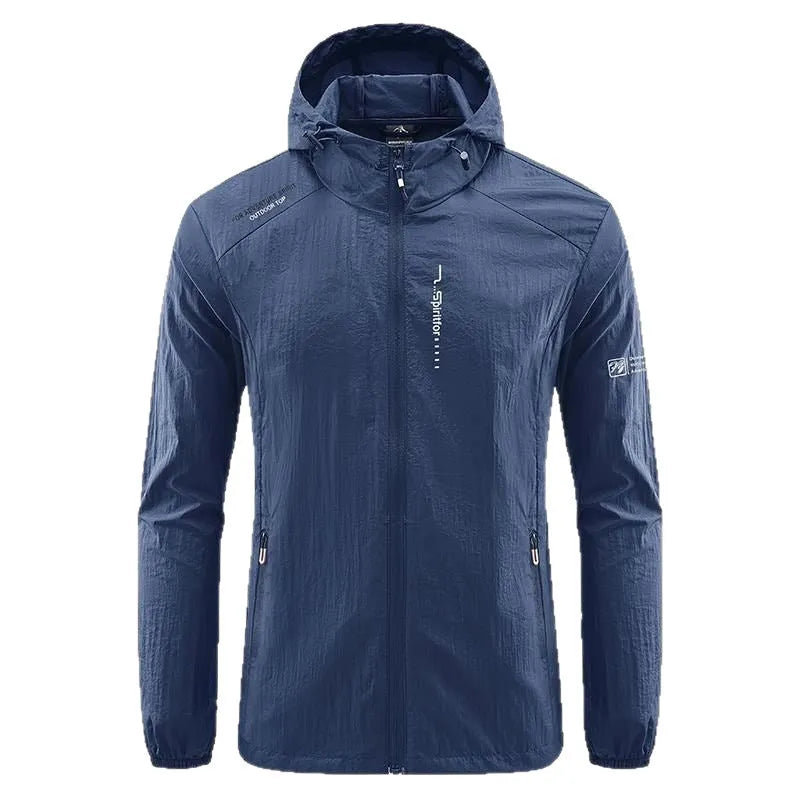 Man wearing a lightweight light grey hooded summer jacket made of thin nylon.