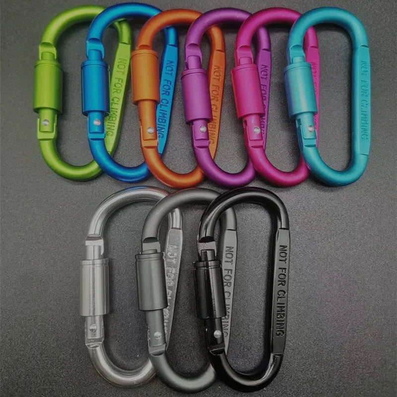 Aluminium D-shaped carabiner with lock shown in multiple colour options including black, silver, red, and blue.