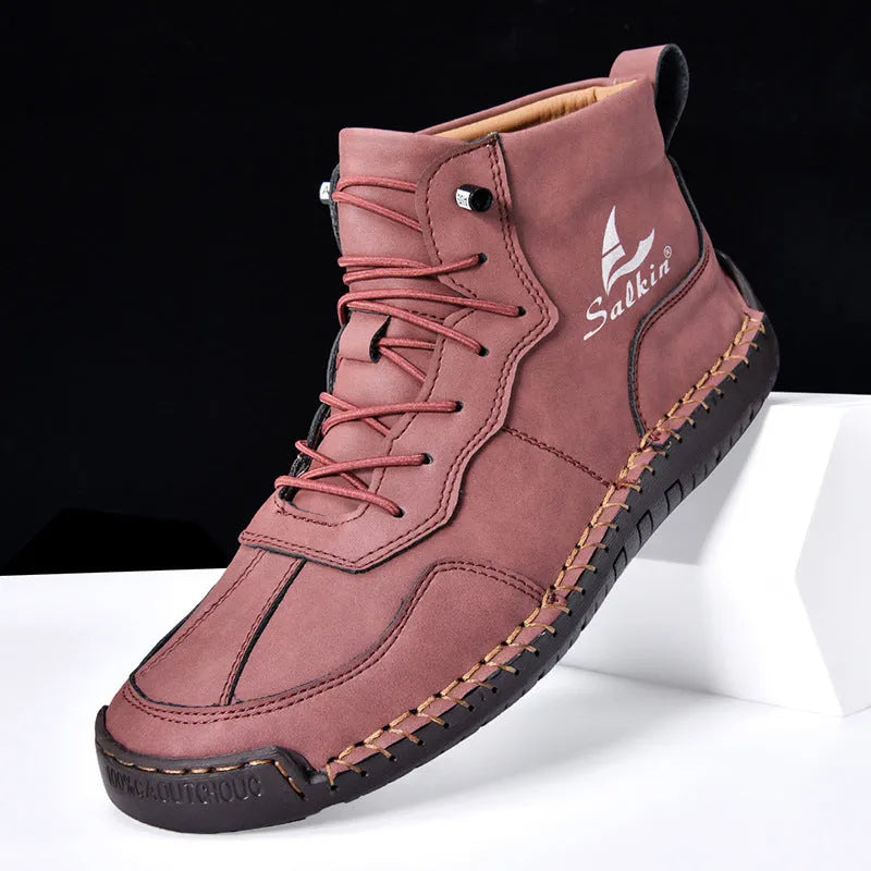 Men's beige retro-style mid-calf boots with an elastic band and flat rubber sole on a white background.