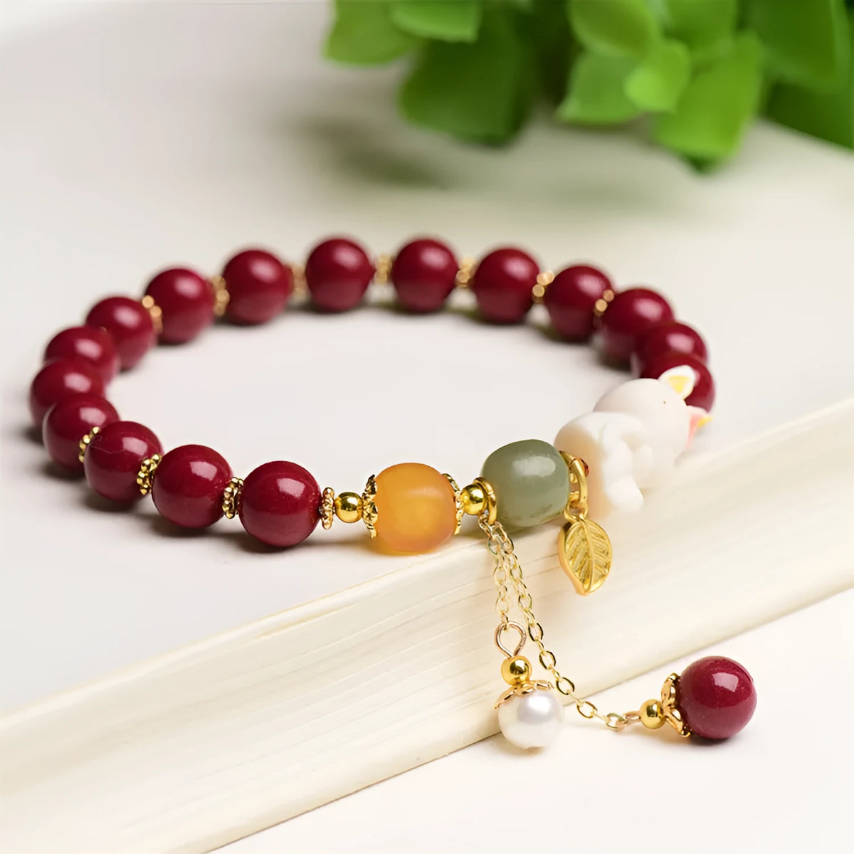 Tian Yu natural cinnabar bracelet with rabbit motif in traditional Chinese style