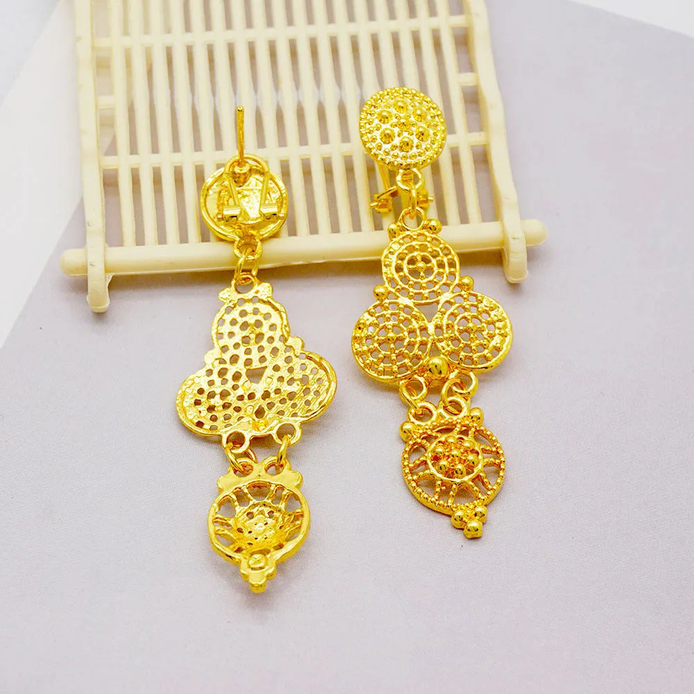 Dubai luxury women's golden jewellery set with tassel necklace, water wave chain, earrings, bracelet and ring in alloy