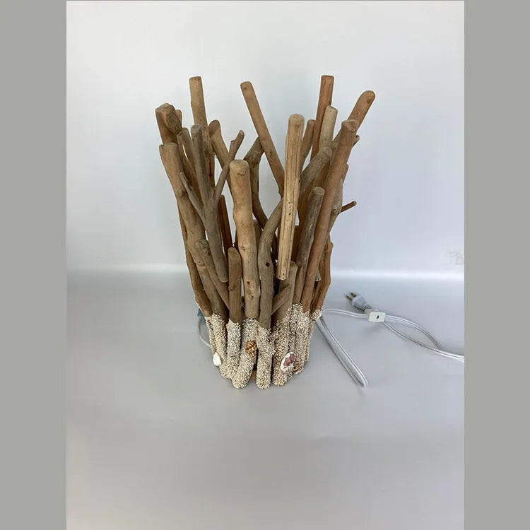 Driftwood decorative table lamp with wood colour finish and 24.5cm square base on a desk