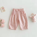 Girls' bow anti mosquito pants in cotton, solid colour, mid waist, available in rubber pink and cream beige, heights 73-120cm.