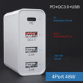 White 4-port USB fast wall charger with UK plug showing PD, QC and USB ports