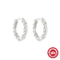 Sterling silver geometric stud earrings with circular design in gold or silver electroplated finish