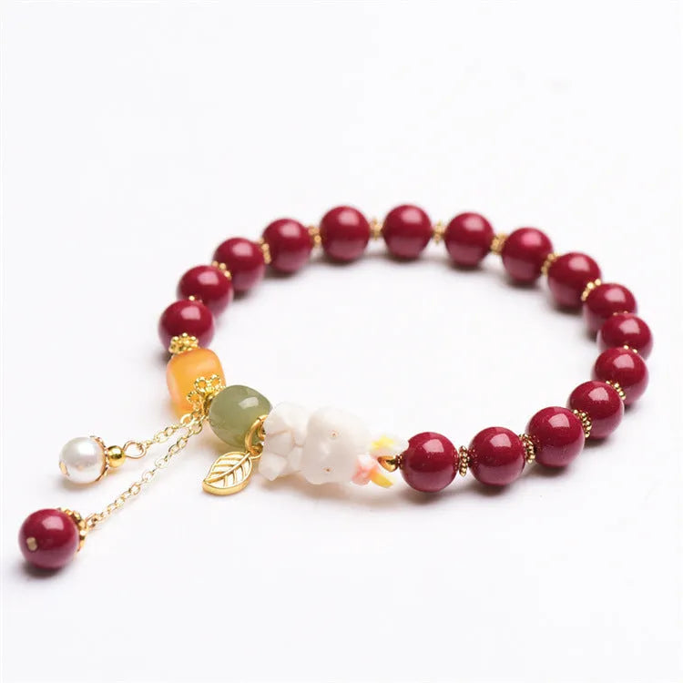 Tian Yu natural cinnabar bracelet with rabbit motif in traditional Chinese style