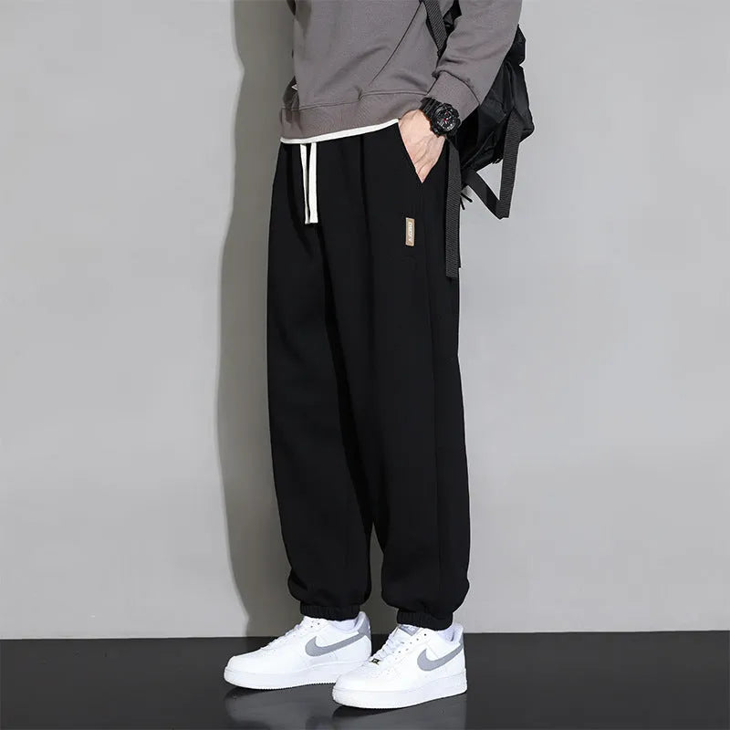 Men's loose casual sports trousers in grey, black, or army green, sizes M-8XL, cotton polyester, mid waist drawstring.