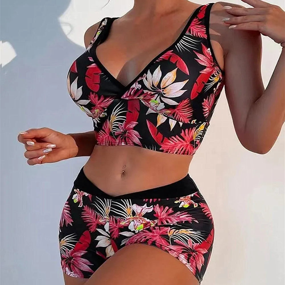 Women's two-piece printed boxer style bikini set in a multi-colour design on polyester fabric.