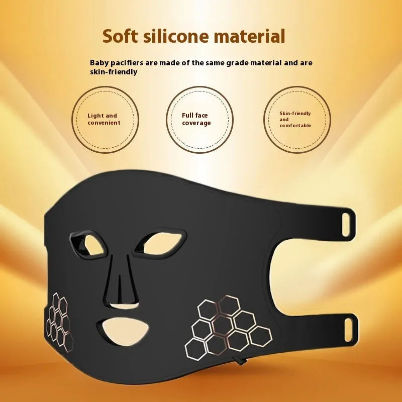 Black four-colour LED photon mask for home skin therapy on a white background.
