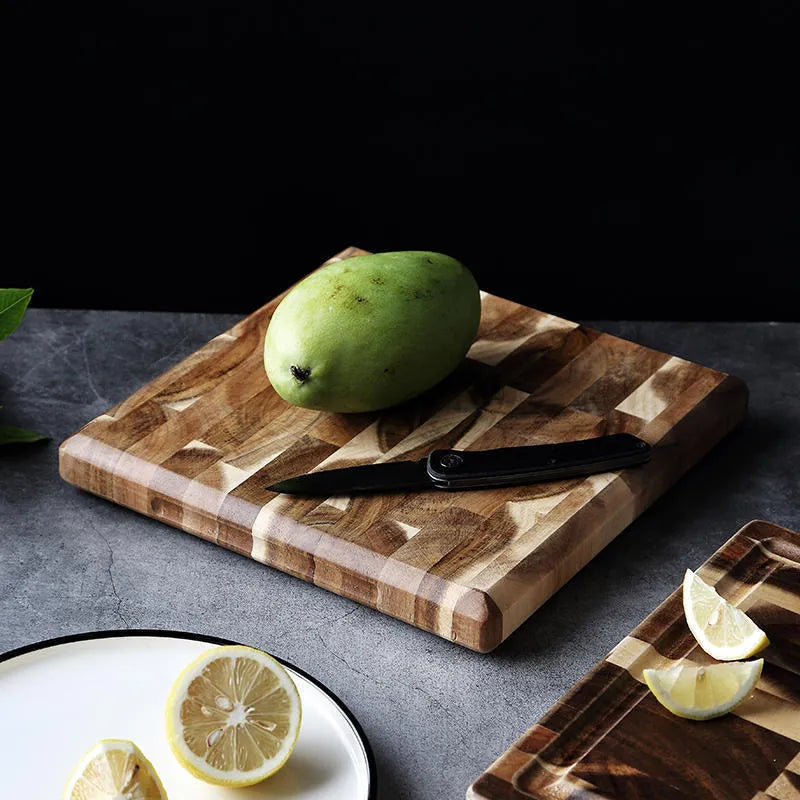 Brown acacia wood kitchen cutting board showing wood grain and 3cm thickness.