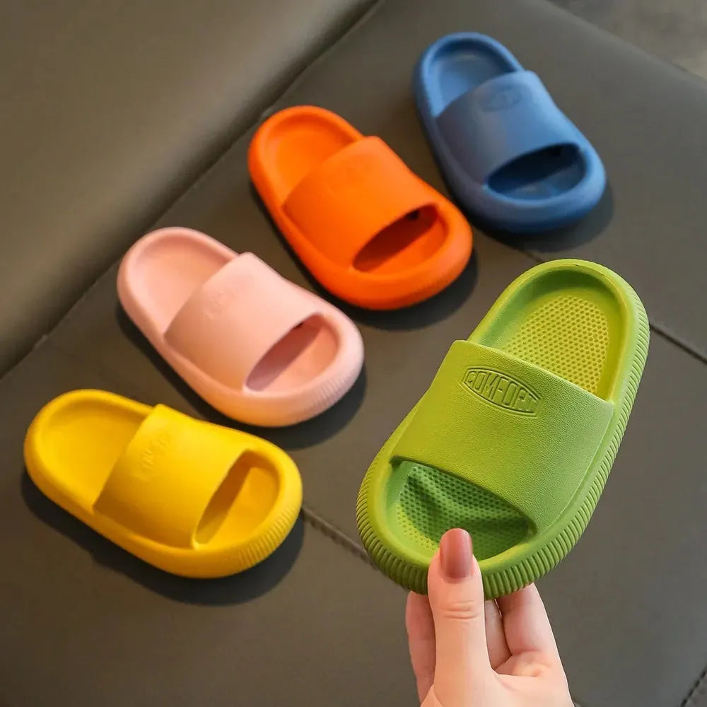 Colourful children's EVA slippers with a non-slip sole, shown in mixed colours on a white background.