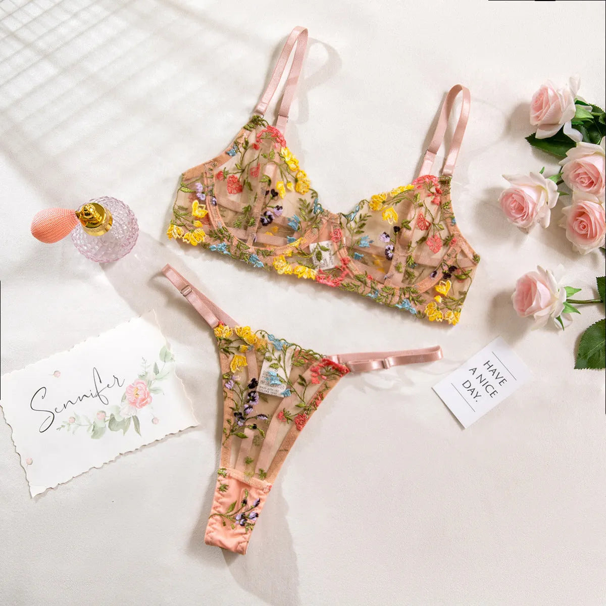 Floral pattern mesh bra and underwear set with T-back straps and 3/4 cups.