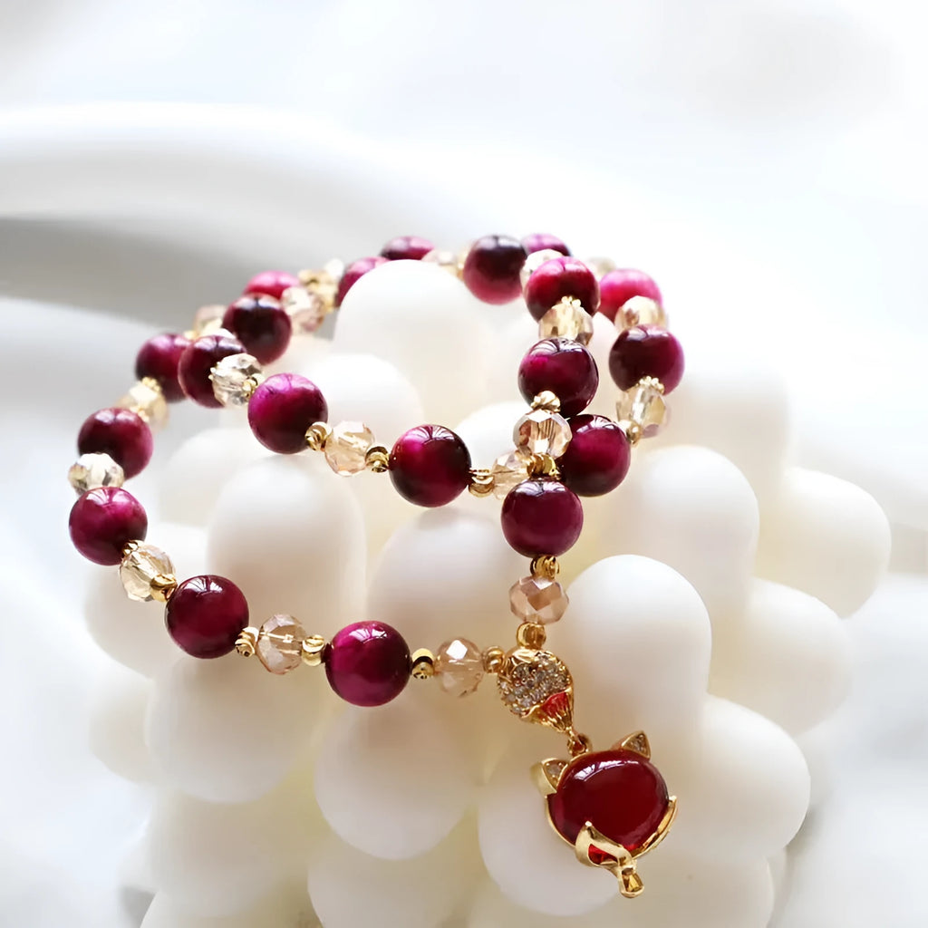 Handmade natural Tigereye stone bracelet with chain design and animal motifs