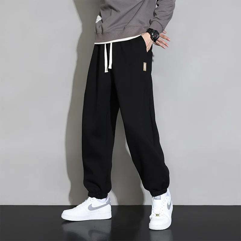 Men's loose casual sports trousers in grey, black, or army green, sizes M-8XL, cotton polyester, mid waist drawstring.