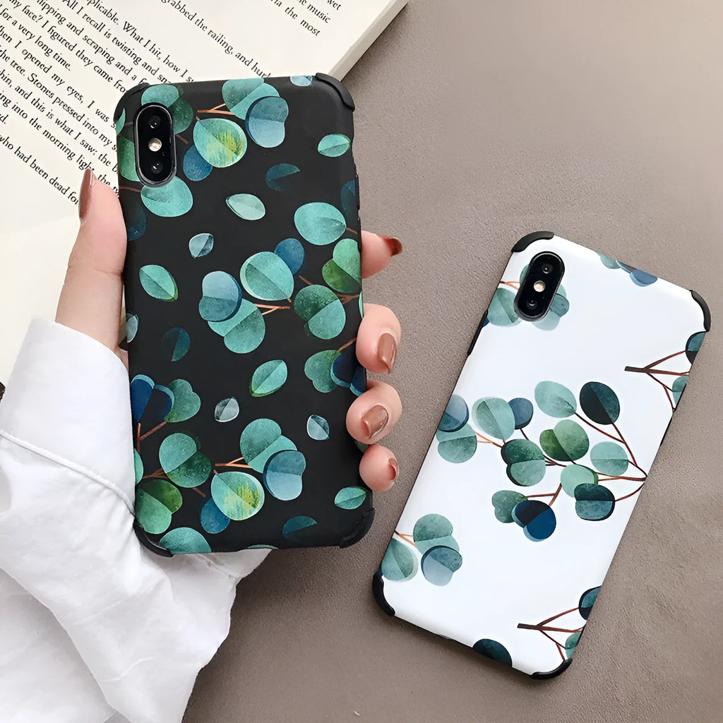 Black silicone iPhone case with raised leaf pattern texture on back