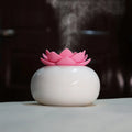 Lotus aromatherapy humidifier with ceramic polishing container and PE lotus, 100 x 85MM, 200ml, in green and white.
