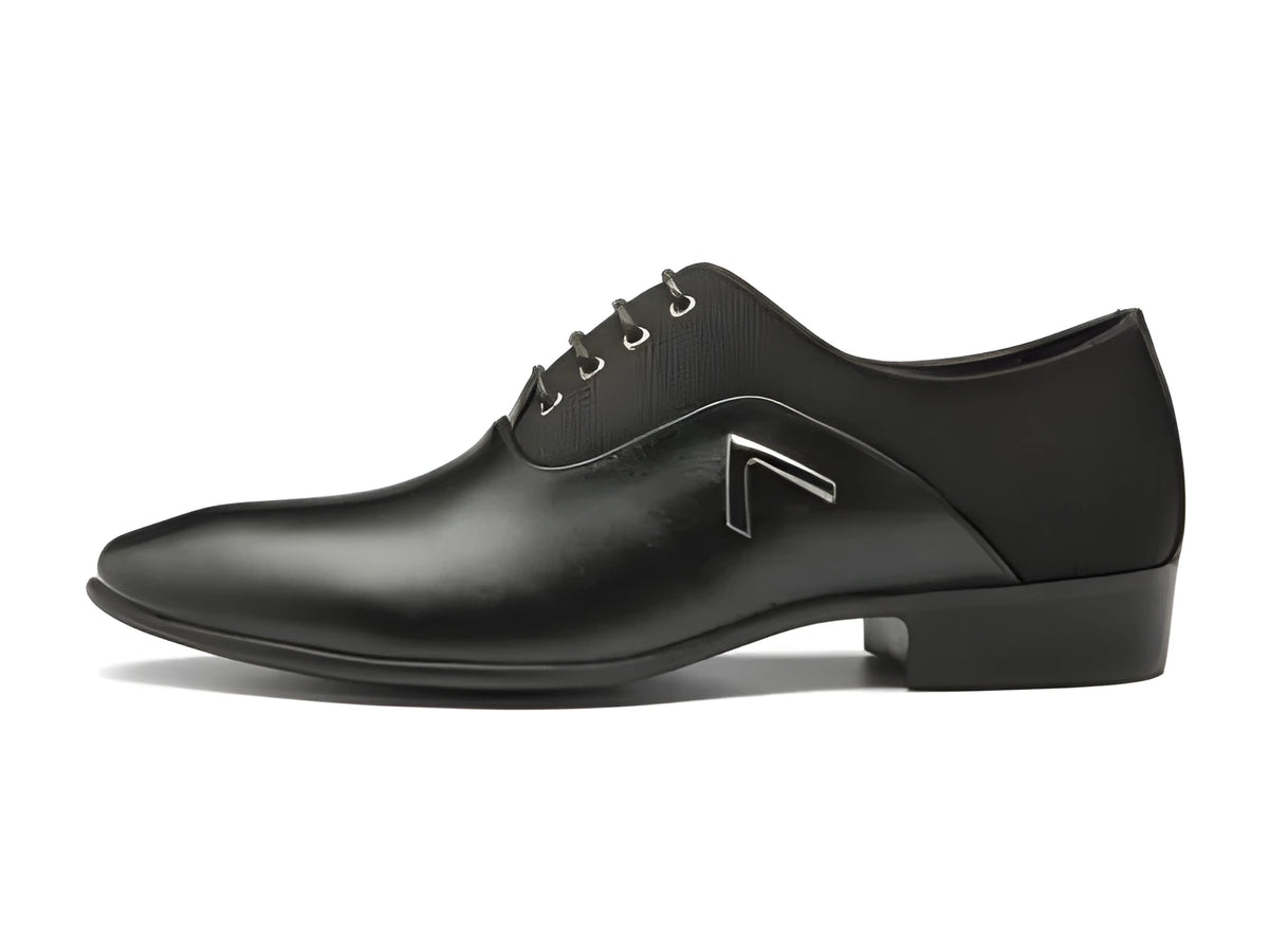 Men's black artificial leather Oxford shoe with a low top and rubber sole on a white background.