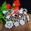 Silver carbon steel flower paper cutting die measuring 14.3 by 9.9 centimetres.