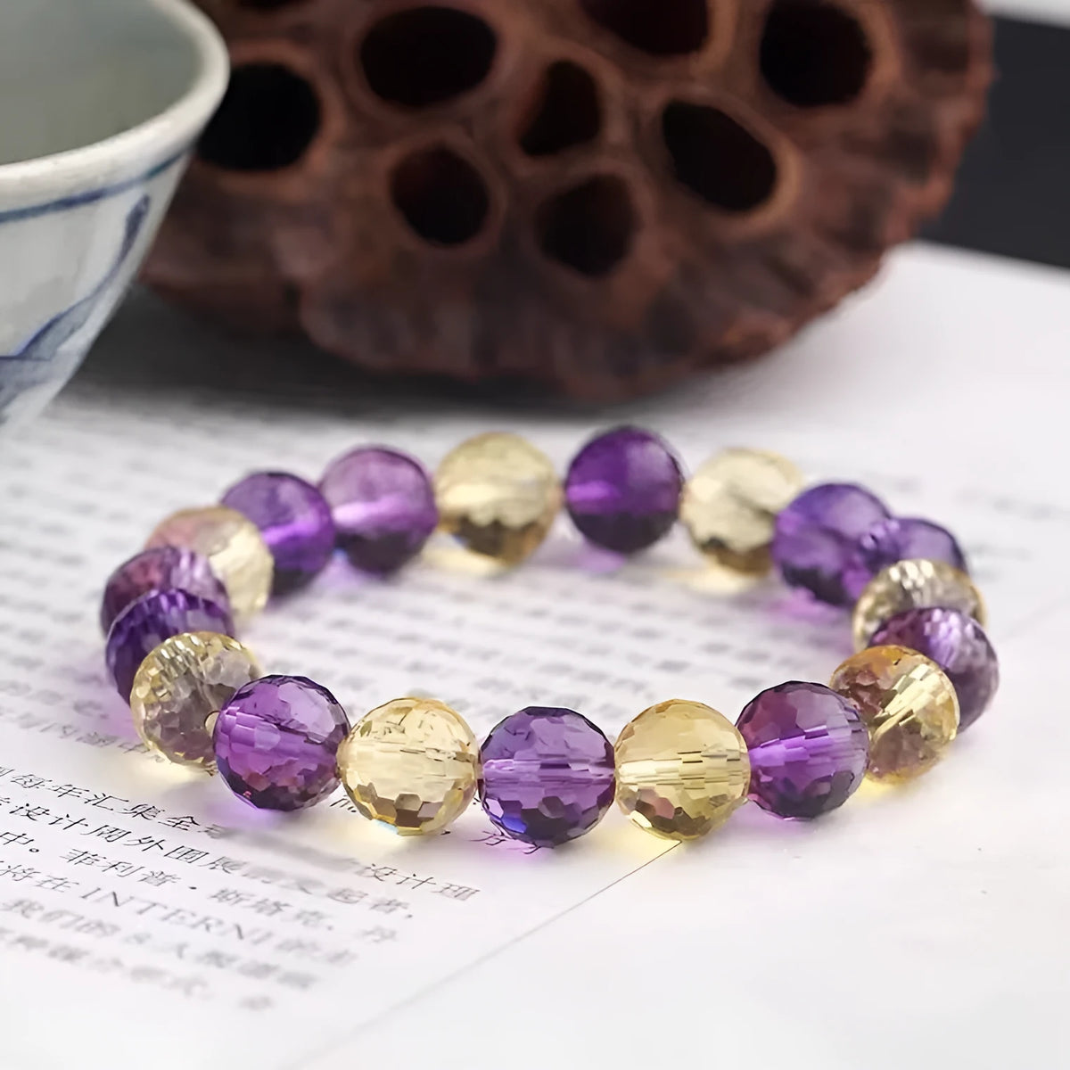 128-cut ametrine crystal bracelet with faceted beads showing constellation and heart shapes